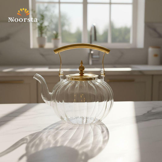براد شاي بايركس حراري مضلع بلمسة ذهبية سعة 1200 مل - Elegant Ribbed Pyrex Glass Teapot with Infuser - Noorsta