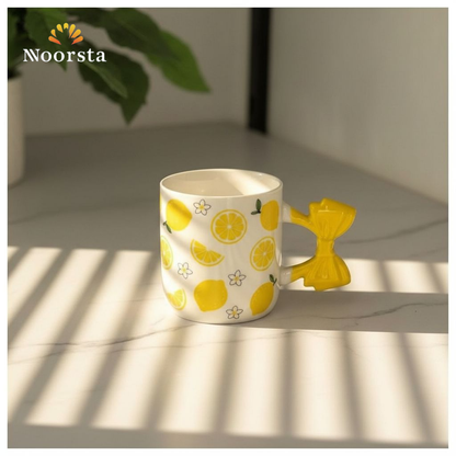 مج بورسلين شيك بنقشة الليمون ويد فيونكة صفراء - Chic Lemon Pattern Porcelain Mug with Yellow Bow Handle - Noorsta