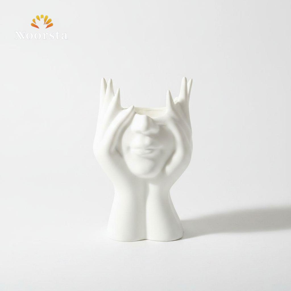 حامل فرش مكياج بتصميم وجه نحتي - Modern Sculptural Face Vanity Organizer - Noorsta