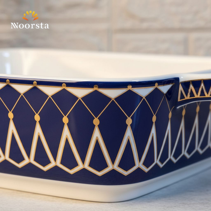 طاجن بورسلين مستطيل شيك لعزومات العيلة - Elegant rectangular porcelain baking dish with gold pattern - Noorsta