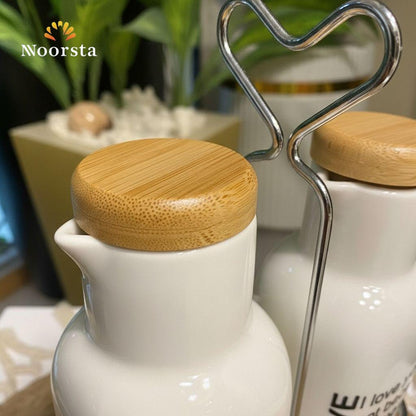 طقم زجاجات زيت وخل سيراميك 'الحب الحقيقي' مع حامل خشب بامبو ومقبض معدني