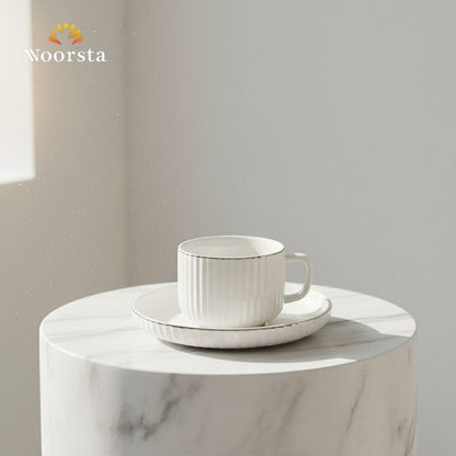طقم فناجين قهوة شيك للضيافة - Elegant White Ribbed Coffee Cup Set with Silver Trim - Noorsta