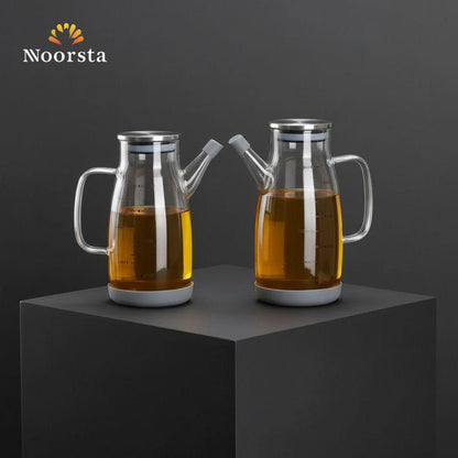 إبريق توزيع الزيت الزجاجي المدرج عالي الجودة مع غطاء ستانلس ستيل