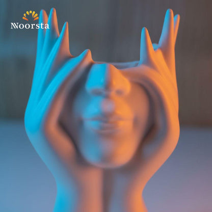 حامل فرش مكياج بتصميم وجه نحتي - Modern Sculptural Face Vanity Organizer - Noorsta
