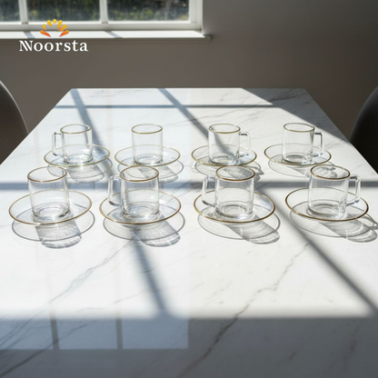 طقم مجات زجاج شفاف بحواف دهبي شيك للتقديم - Elegant clear glass mug and saucer set with gold rim - Noorsta